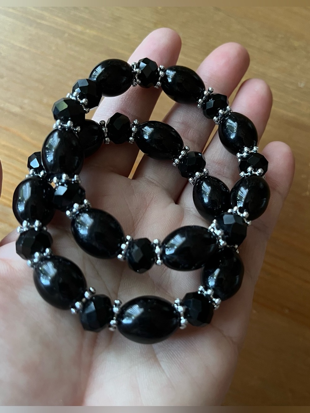 Set of two black glass bracelets glass chunky